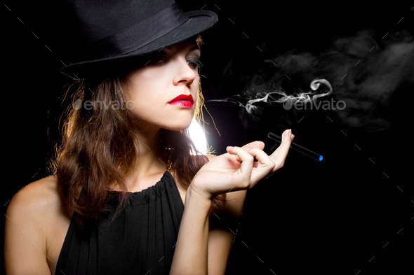 Woman with Thin Electronic Cigarette (Misc) Photo Download