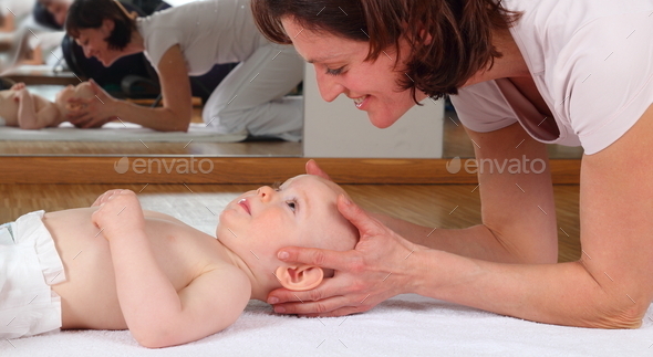 Osteopathy with baby with blockade on cervical vertebrae