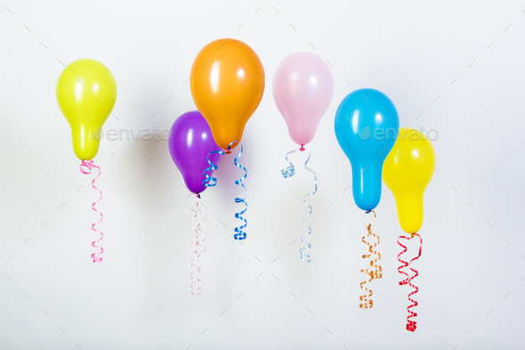 Balloons of different bright colors on a white background (Misc) Photo Download