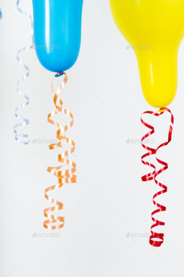 Balloons of different bright colors on a white background (Misc) Photo Download