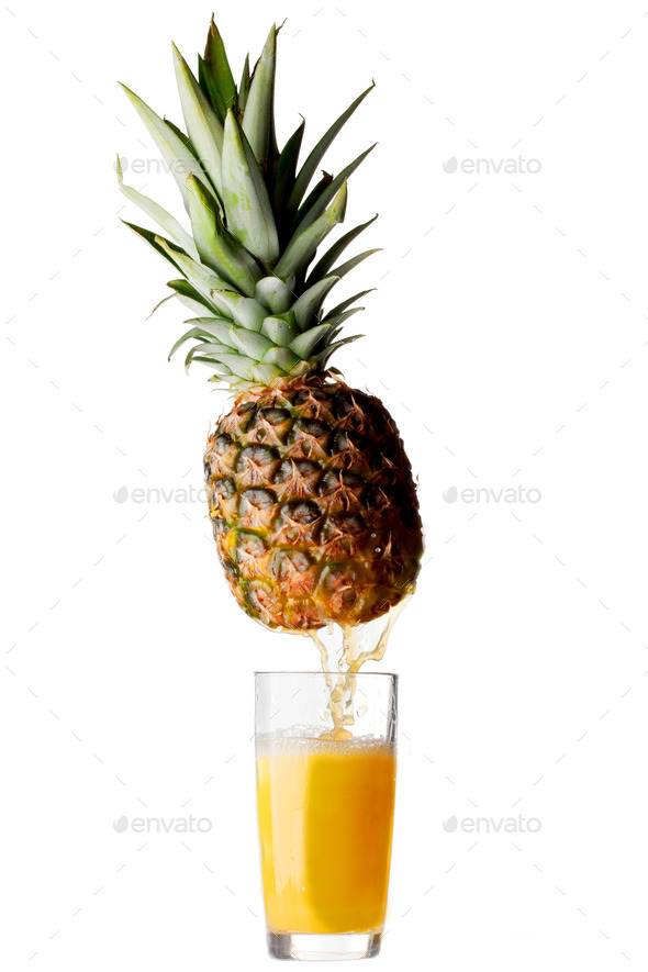 Juice pouring from pineapple (Misc) Photo Download