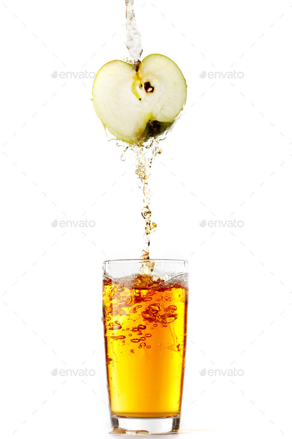 Juice pouring from apple (Misc) Photo Download