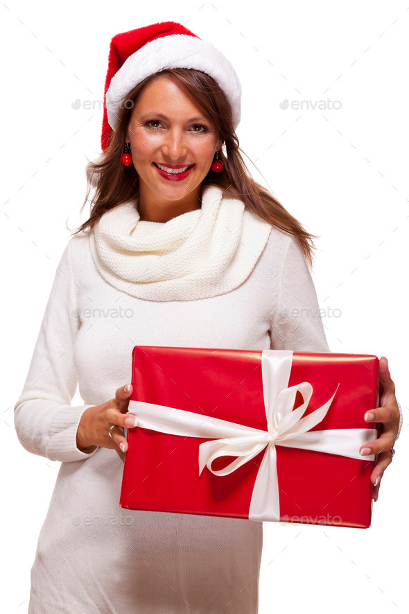 Pretty woman in a Santa hat with a large gift (Misc) Photo Download