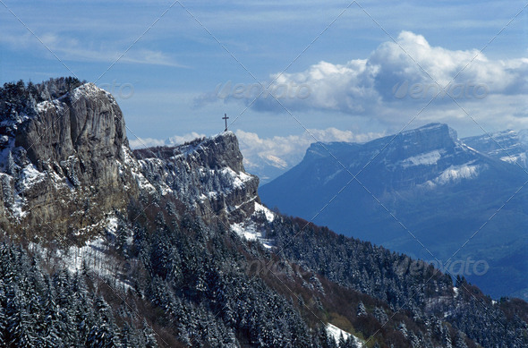 Cross and mountains near Chambery, France