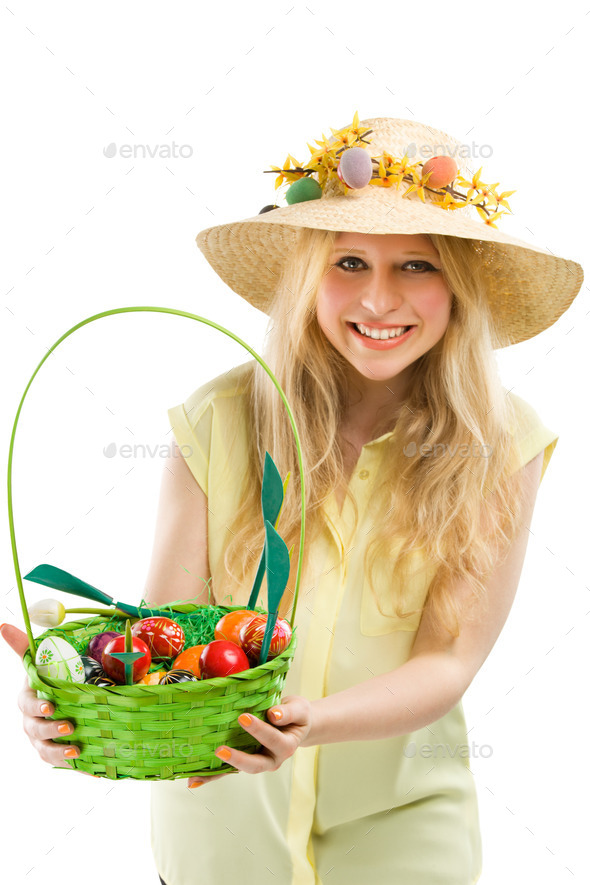 girl holding basket of colored eggs for easter (Misc) Photo Download