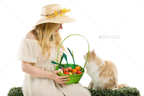 girl holding basket of colored eggs for easter (Misc) Photo Download