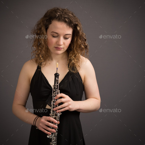 Beautiful Young Female Oboist (Misc) Photo Download