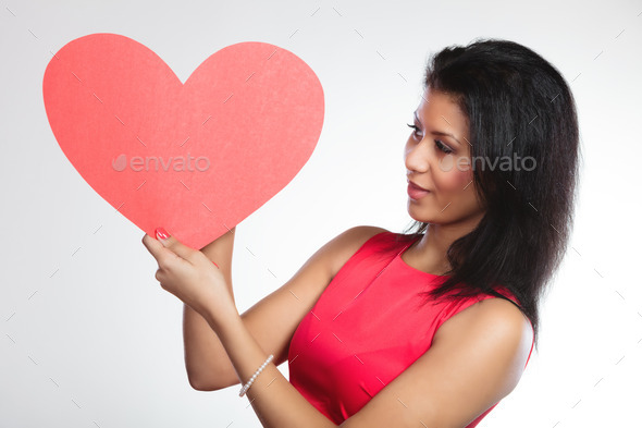 Girl mixed race with paper red heart (Misc) Photo Download