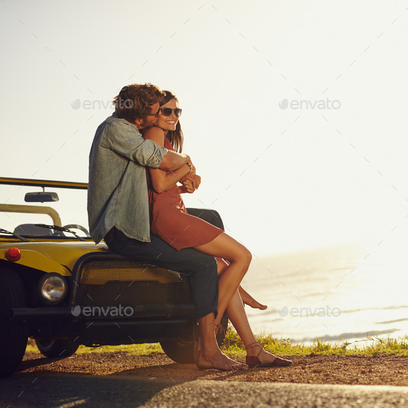 Romantic young couple on road trip