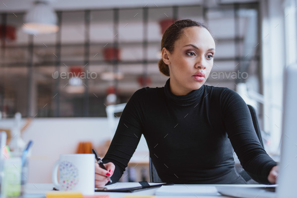 Young woman working new business assignment