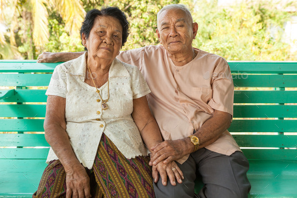 Happy Senior couple sitting indoor