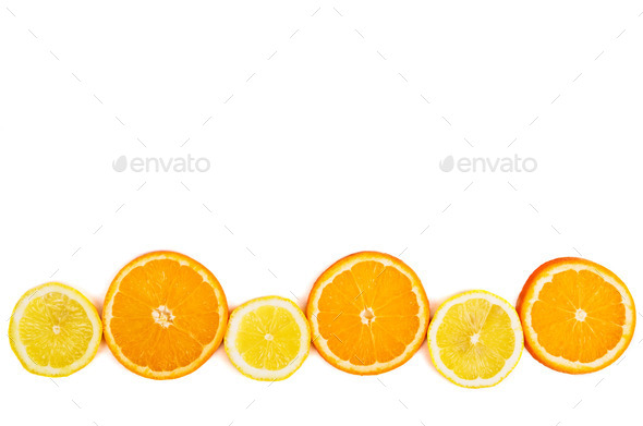 chopped orange and lemon on a white backgroundv (Misc) Photo Download