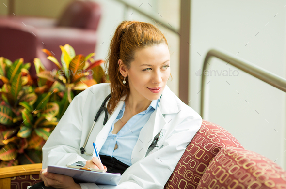 woman doctor sitting in her office relaxing having a midday break