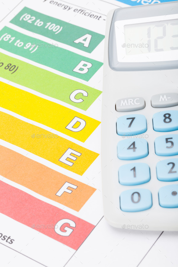 Colorful energy efficiency chart and neat calculator over it