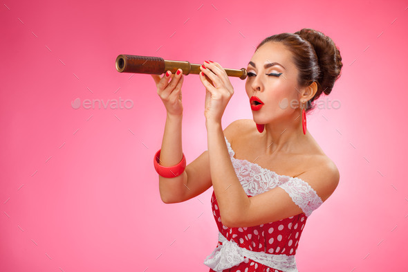 Happy Woman Holding Telescope. Pin-Up Retro style. (Misc) Photo Download