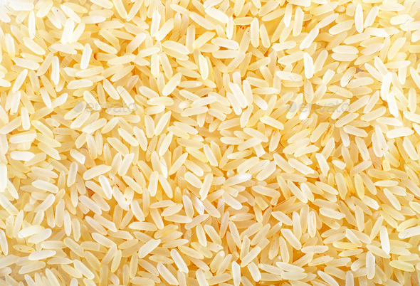 Raw rice on the table, portion of the raw rice