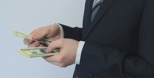 Businessman Counting Money Businessman Counting Money