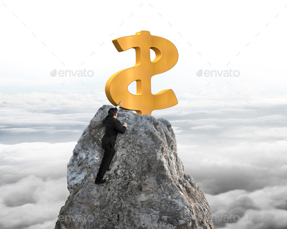 Businessman hand wanting for dollar sign on peak with cloudscape (Misc) Photo Download