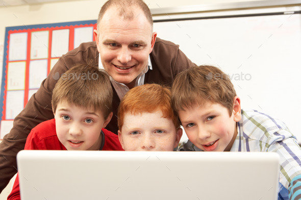 Group Of Schoolboys In IT Class Using Computer (Misc) Photo Download