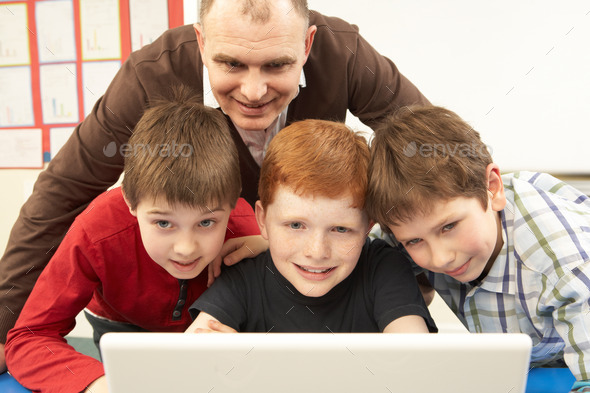 Group Of Schoolboys In IT Class Using Computer (Misc) Photo Download