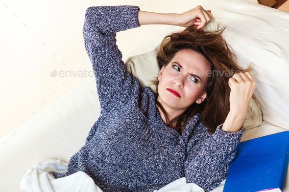 Woman suffering from head pain taking power nap