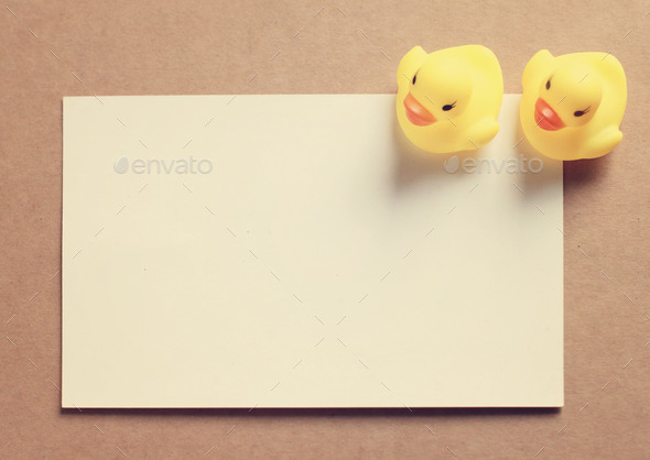 Two doll ducks on blank card with retro filter effect (Misc) Photo Download