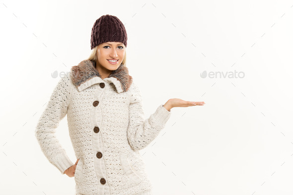 Blonde Girl In Winter Clothes, With Outstretched Palm (Misc) Photo Download