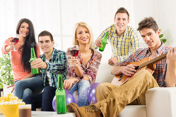 Young People At House Party Toast (Misc) Photo Download