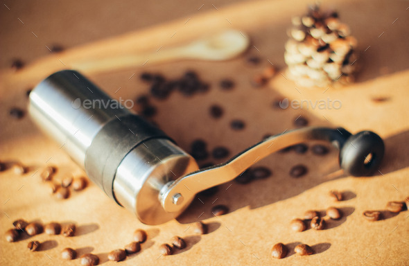 Coffee grinder and spoon with coffee beans, retro filter effect (Misc) Photo Download