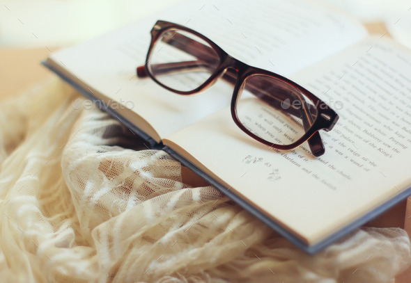 Eyeglasses and book with retro filter effect (Misc) Photo Download