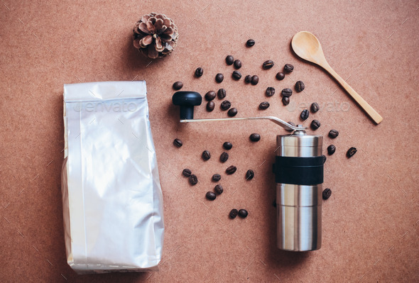 Coffee grinder and bag with coffee beans, retro filter effect (Misc) Photo Download