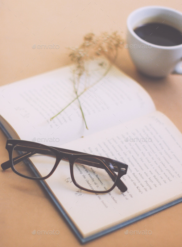 Eyeglasses and book with black coffee , retro filter effect (Misc) Photo Download