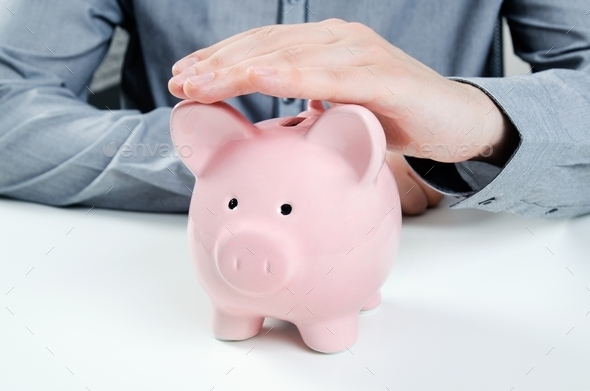 Business man with piggy bank. Saving money concept (Misc) Photo Download