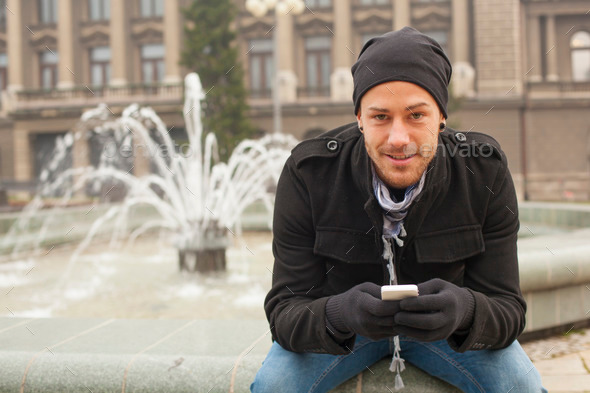 Young Man With Mobile Phone Joy In City (Misc) Photo Download