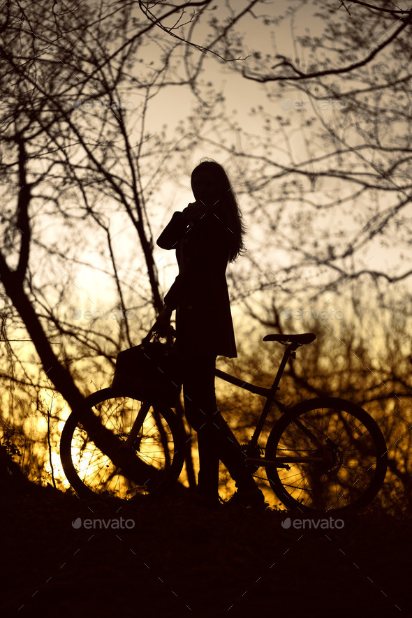 Woman With Bike Silhouette