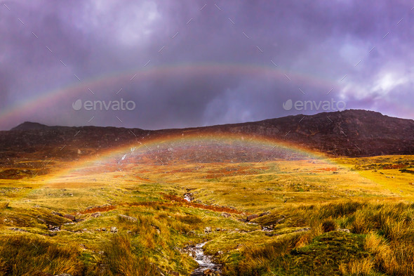 Rainbows over a Snowdonia waterfall in the Llanberis Pass