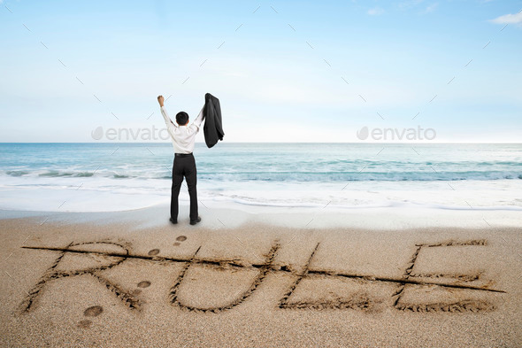 Businessman cheering with rule word deleted line on sand beach (Misc) Photo Download