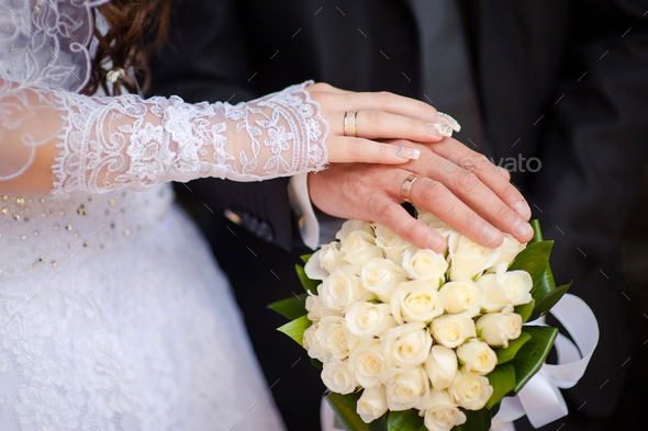 Hands and rings and wedding bouquet (Misc) Photo Download