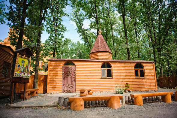 wooden orthodox church on a background of trees (Misc) Photo Download