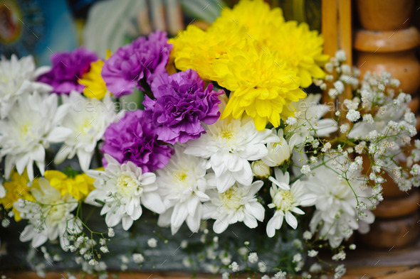 Bouquet of White yellow and purple flowers in church (Misc) Photo Download