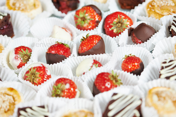 strawberries with chocolate at catering party