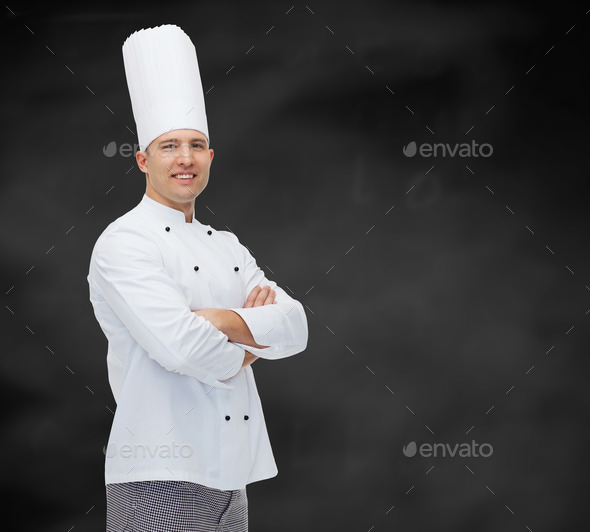 happy male chef cook with crossed hands
