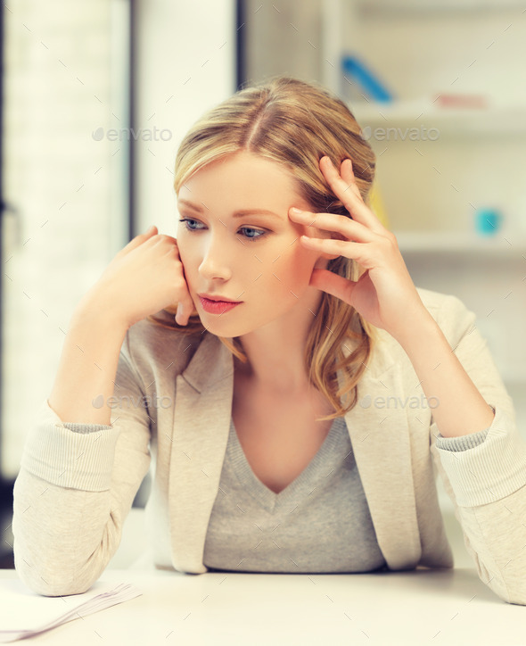 bored and tired woman behind the table (Misc) Photo Download