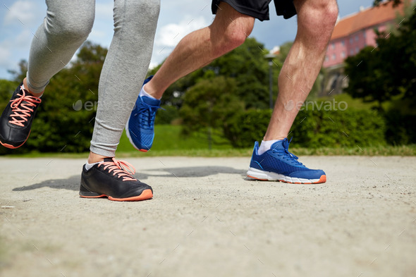 close up of couple running outdoors (Misc) Photo Download