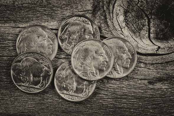 Vintage Indian Head Nickels on Wood