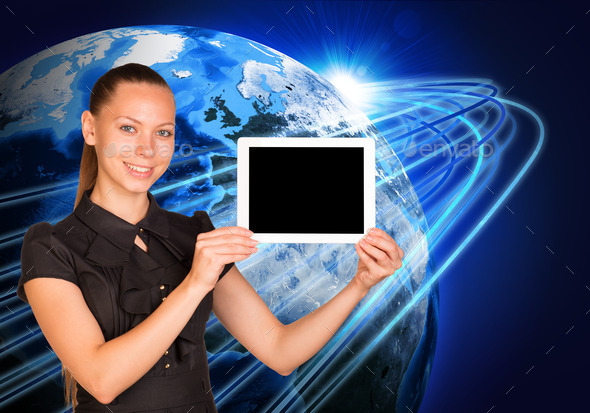 Young woman holging tablet on earth background