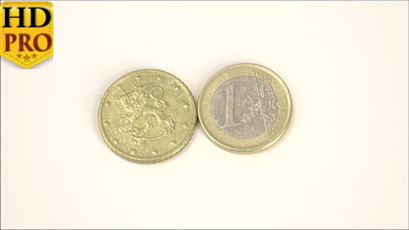 A 2000 Version of a Finnish Euro Coin and a 1 Euro A 2000 Version of a Finnish Euro Coin and a 1 Euro