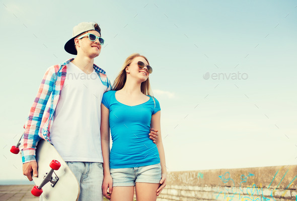 smiling couple having fun outdoors (Misc) Photo Download