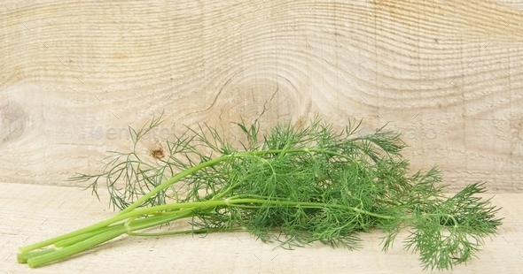 Dill leaves on wooden planking background (Misc) Photo Download