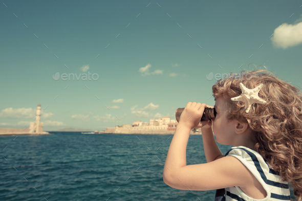 Sailor kid looking through the binoculars (Misc) Photo Download